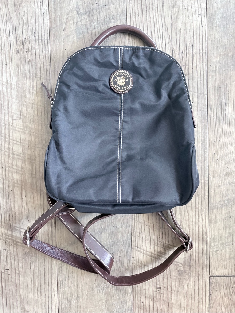 Dooney & Bourke Black Nylon Backpack with Brown Leather Accents